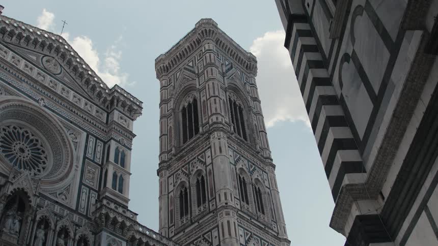 The church has a tall stone tower