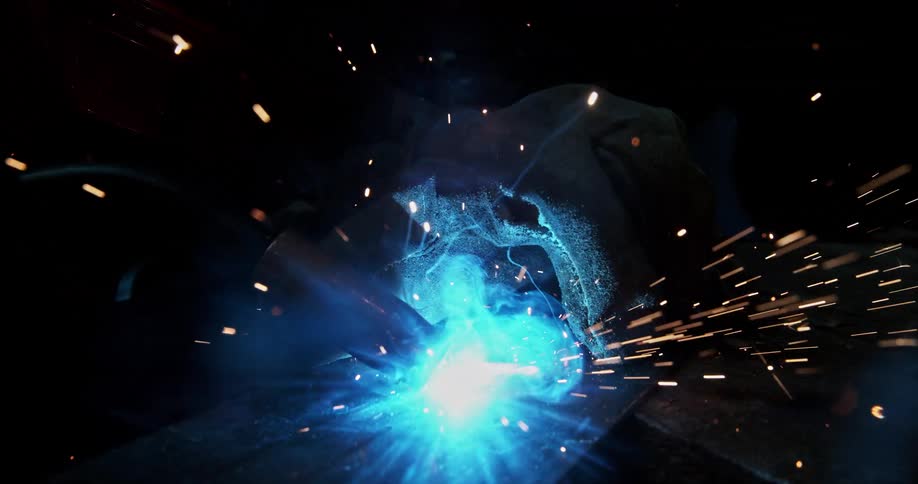 Sparks fly as electric arc fuses metal with precision