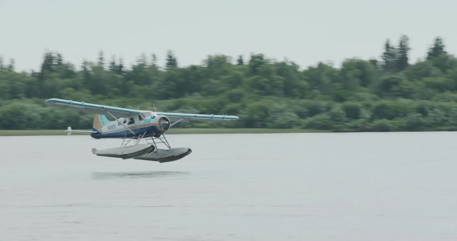 Seaplane speeding across the water during takeoff