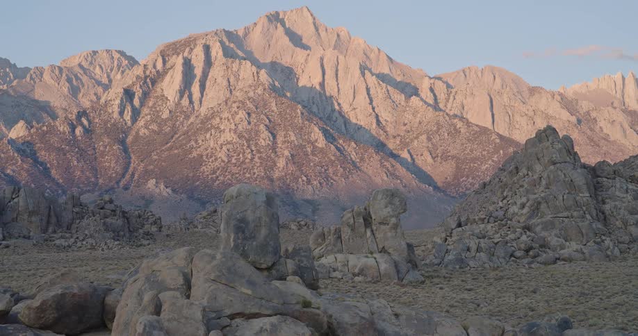 The tall mountains give shade to the badlands