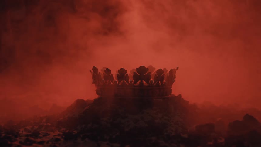 Crown in smoke and intense light amidst incandescent rocks