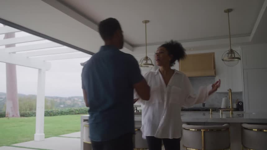 Man and woman have an intense argument in a modern home