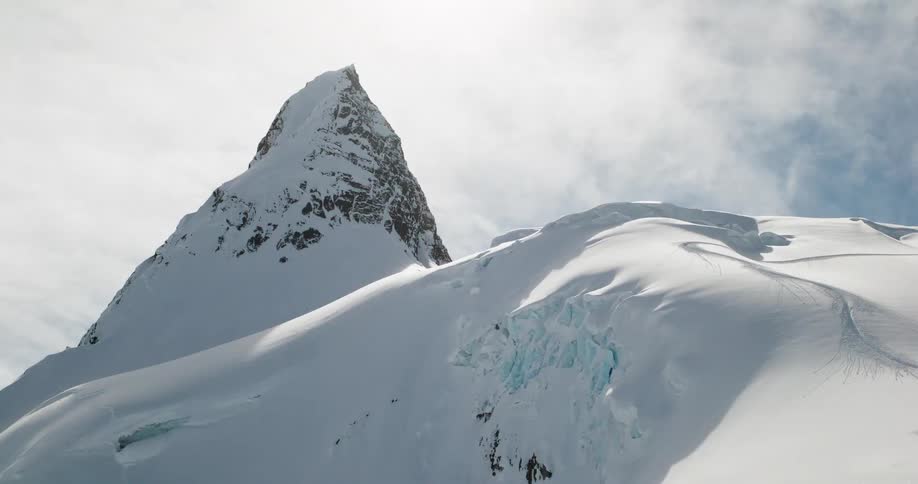 Fluffy white snow covers the mountains
