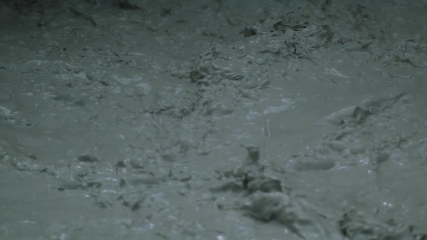 Bubbling mud surface in constant motion