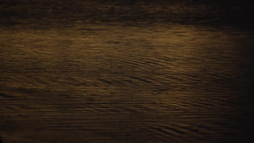 Gentle waves reflecting golden light on the waters surface