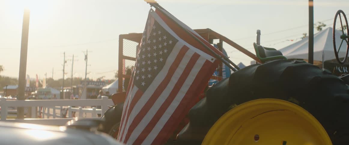 An american flag swaying in the breeze