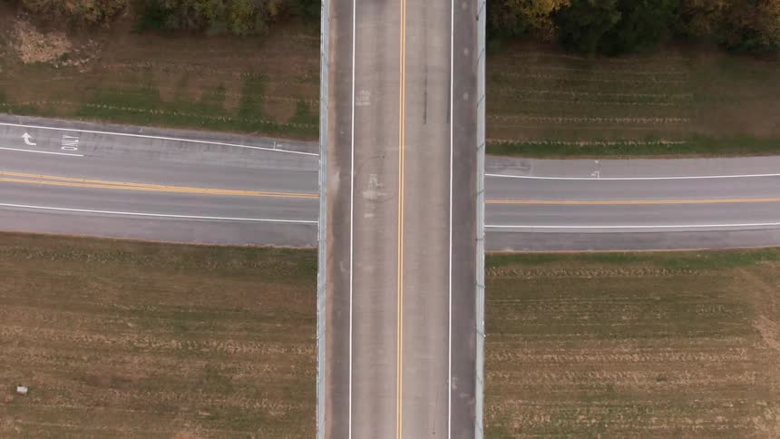 Cars drive on the overpass and road