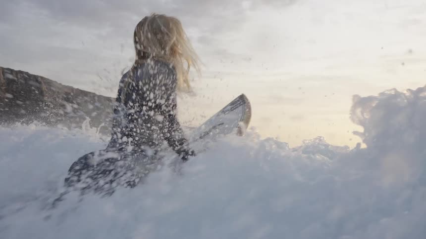 A woman surfing