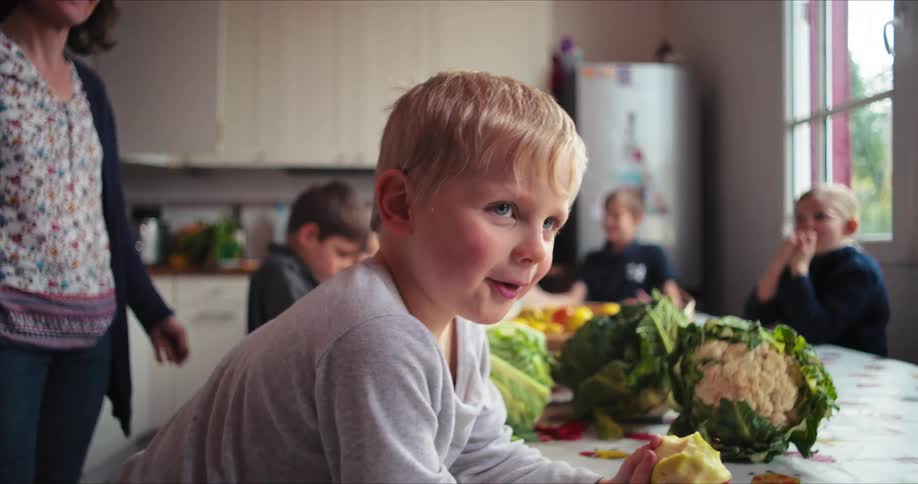 A group of people in a kitchen