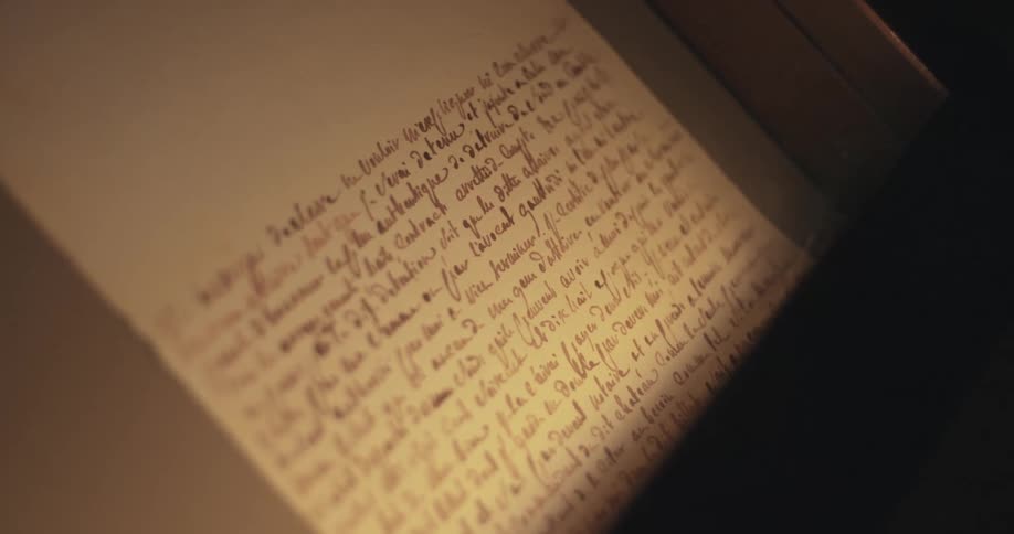 Handwriting is on the paper in the box