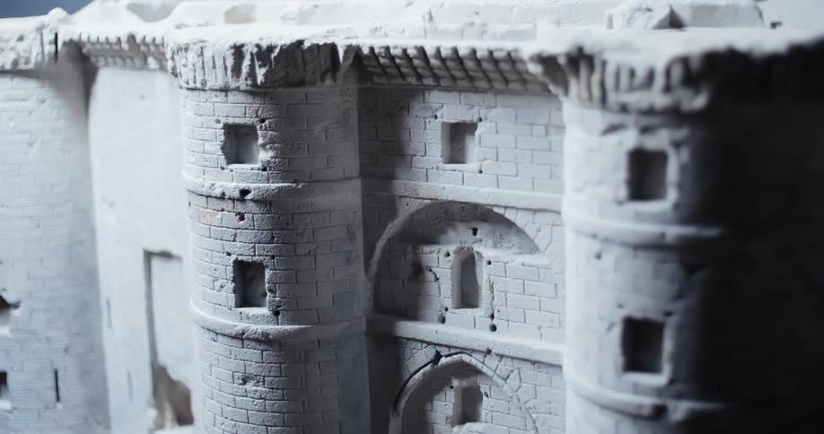 A sculpture of a castle is on display