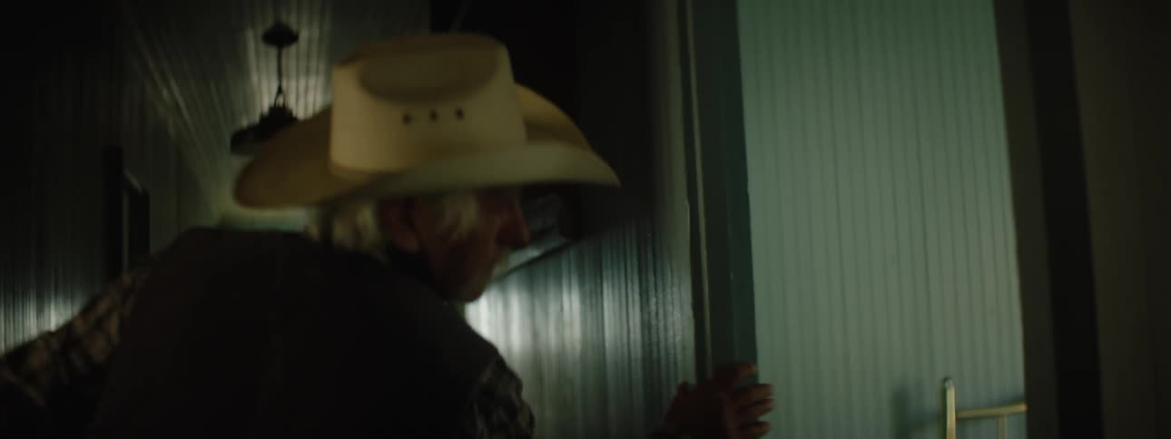 An old man is searching through his house for someone