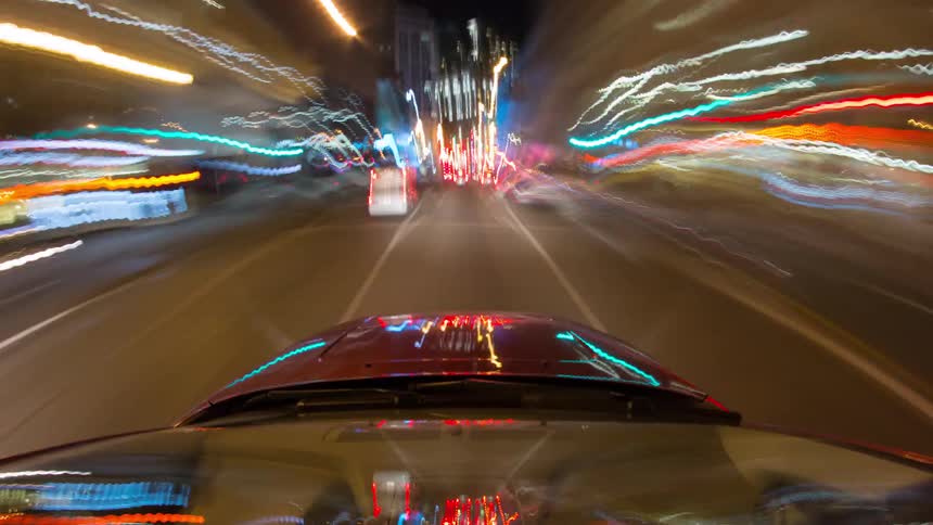 Quickly driving through a city