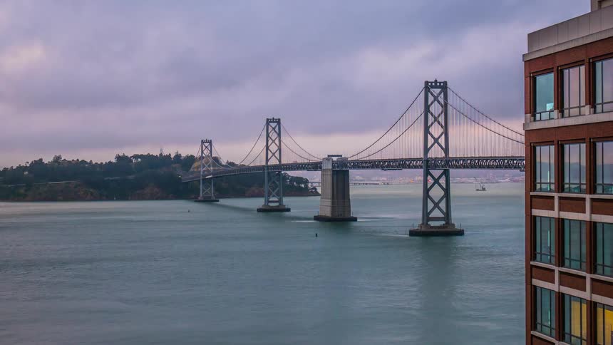 A time lapse of a bridge over water