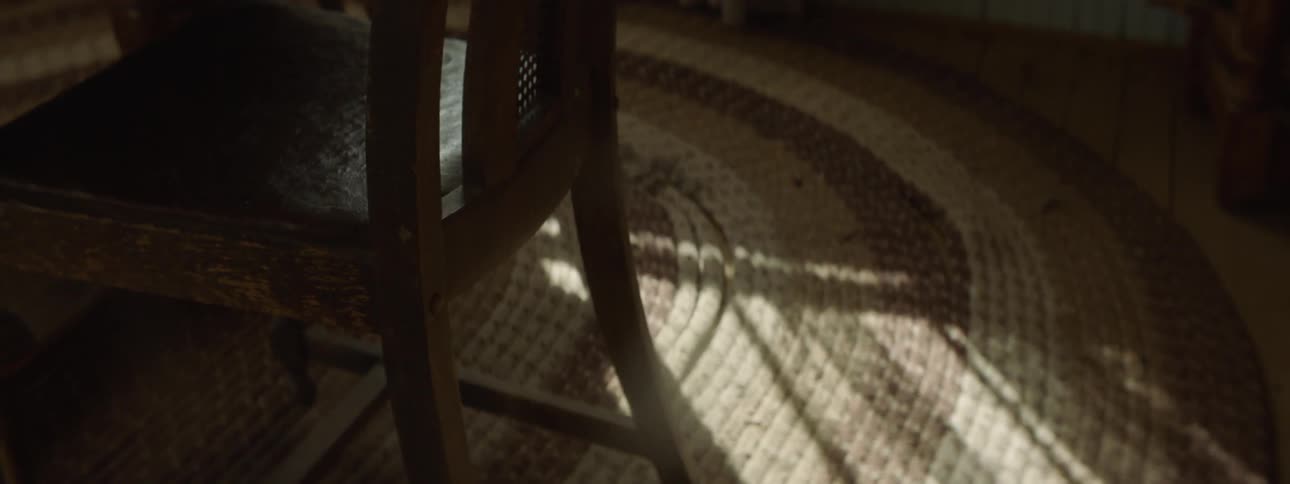 The light is creating a shadow of a chair