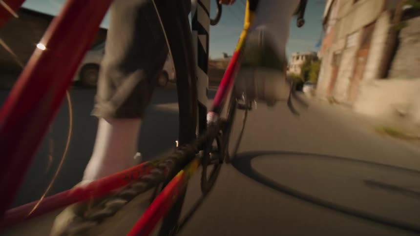 Bicycle pedal in motion under the golden afternoon light