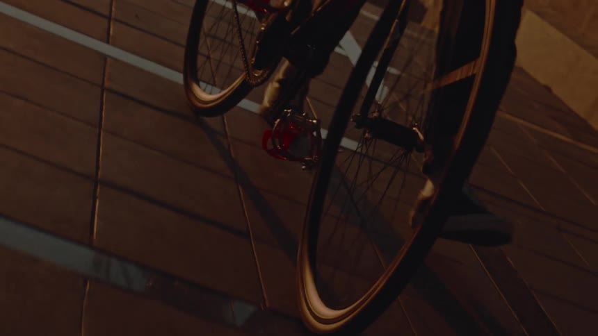 Bicycle wheel illuminated by the golden evening light