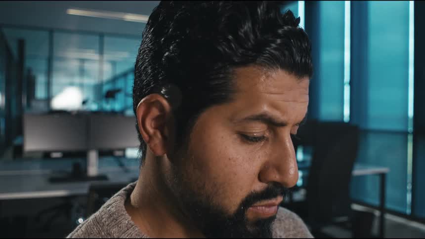 a man is thinking in the office