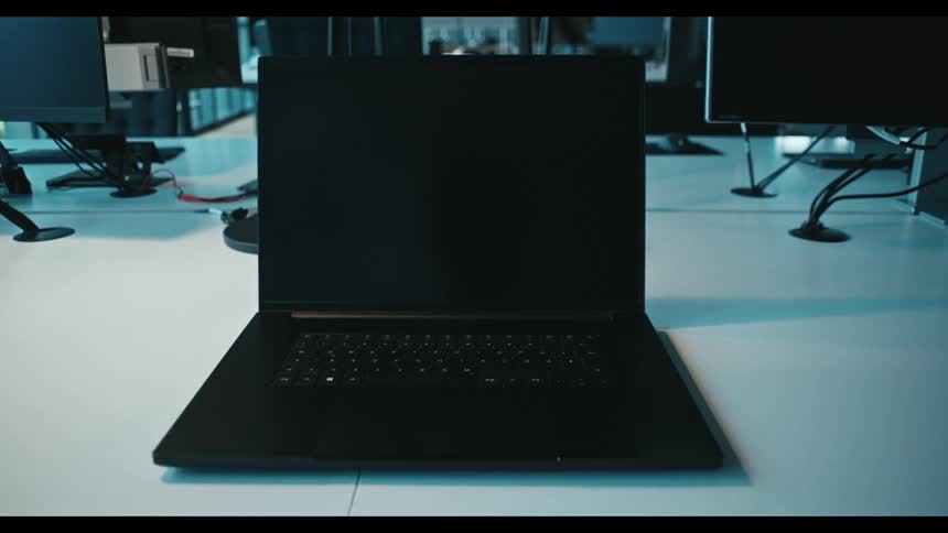 The laptop is opened on the desk