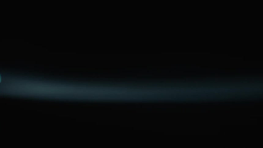 Lights pass by on a dark night