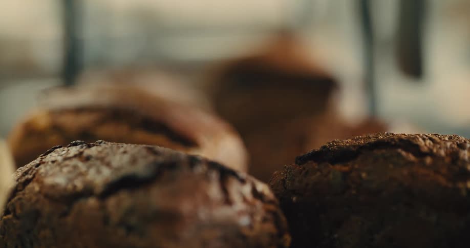Freshly baked artisanal breads with golden crust and rustic texture