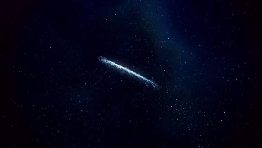 A long slim unidentified flying object is floating in space