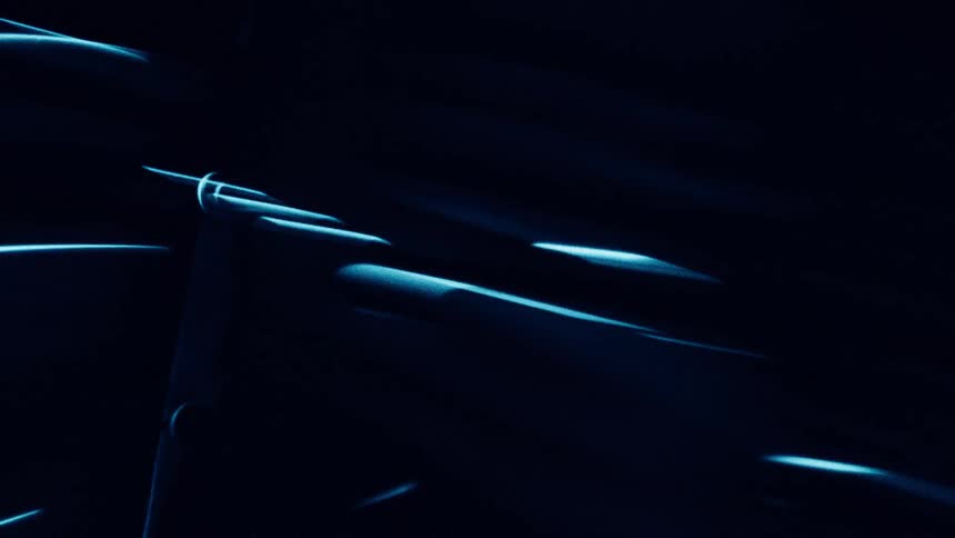 The view spins fast in the dark room