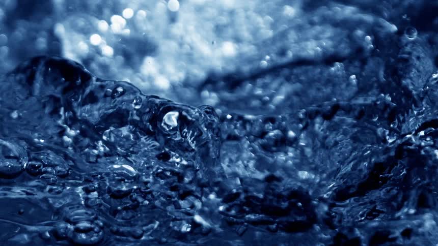 Blue water splashes down