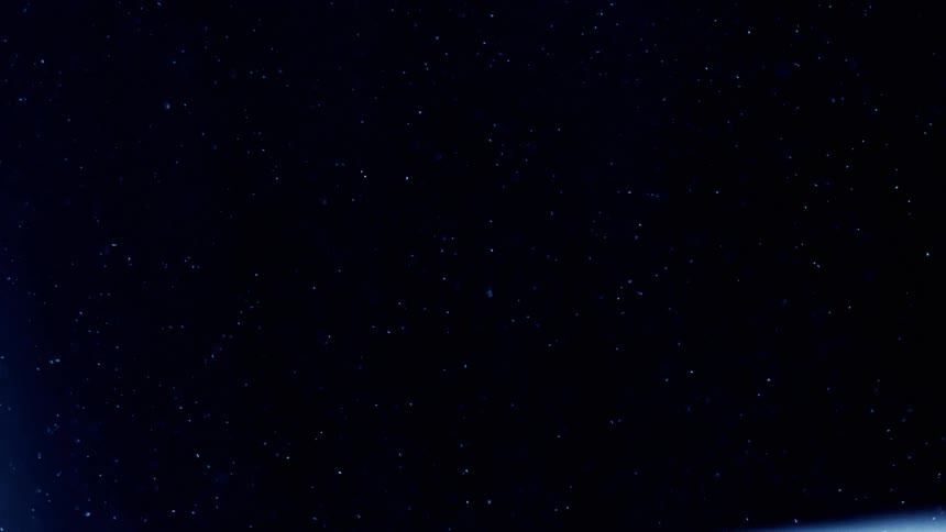 The dust floats around in the dark