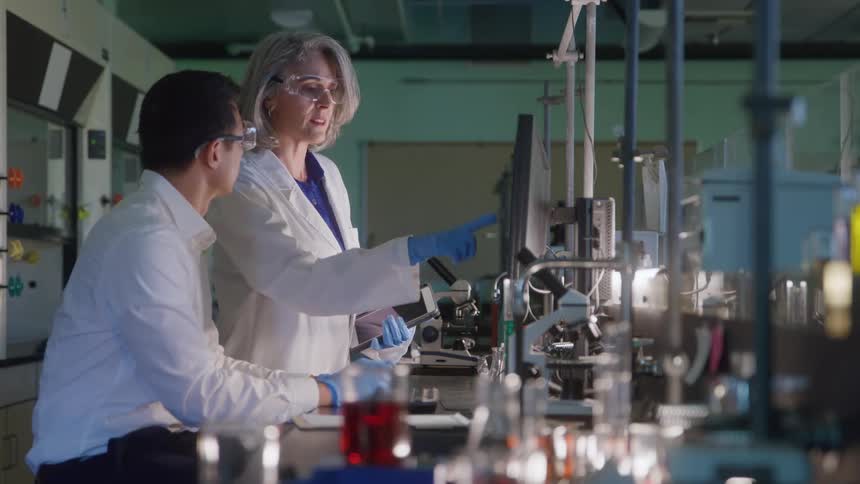 A couple scientists in a lab