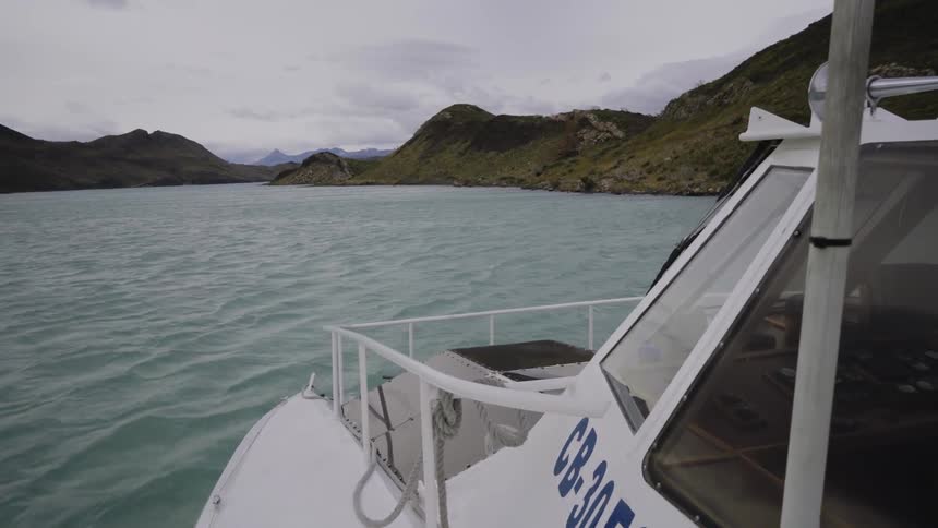 A boat is sailing in the lake