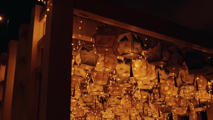 Paper lanterns sway in the breeze
