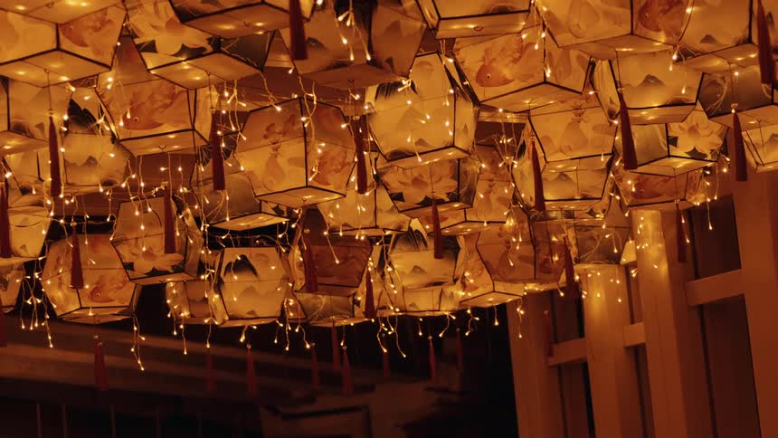 Paper lanterns sway in the breeze