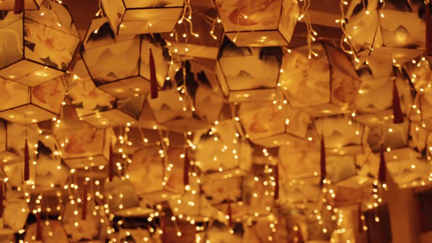 Paper lanterns sway in the breeze