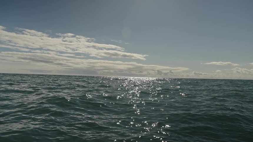 The ocean water is rough during the day