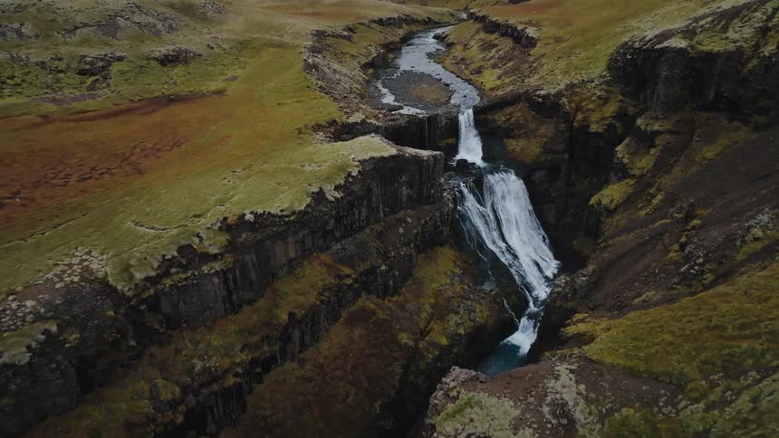 The stream travels through the landscape