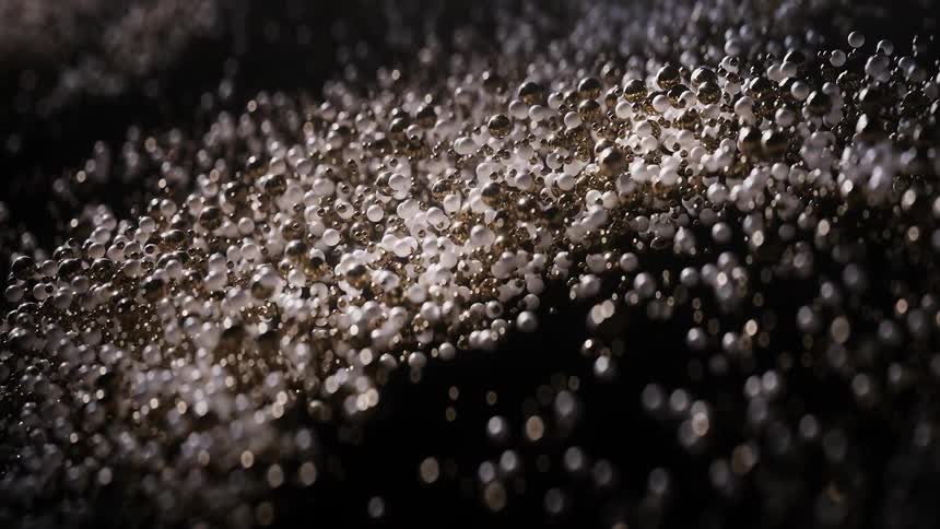 The beads spin around and fly