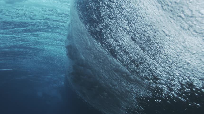 The wave can be seen rising underwater
