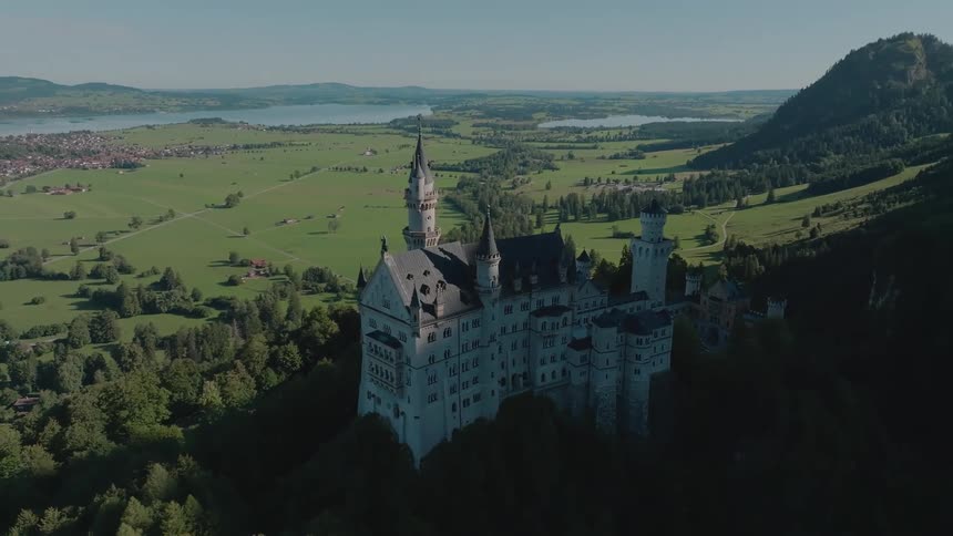 A large castle is up on the hill