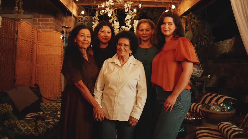 The family of women smile together
