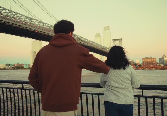 The man surprises a woman by proposing