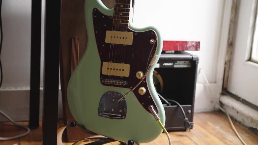 A green electric guitar