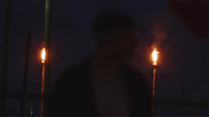Torches burning in the night