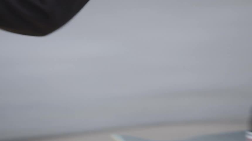 A persons foot on a moving skateboard