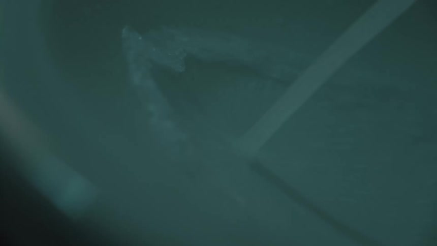Water pouring onto a surface