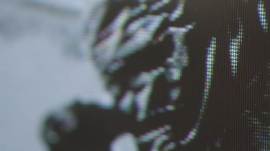 Images flash on the television screen