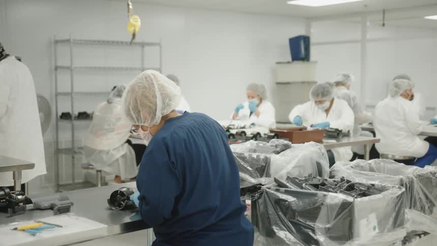 People are working in the factory