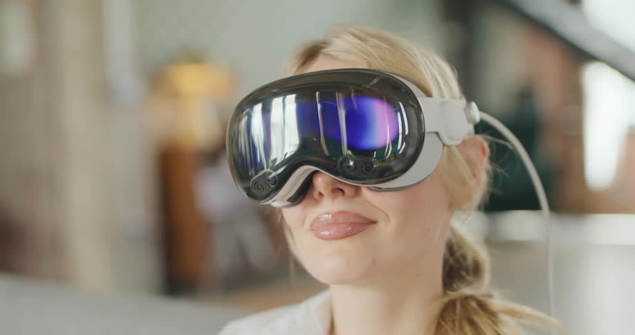 A blonde woman wearing a virtual reality headset