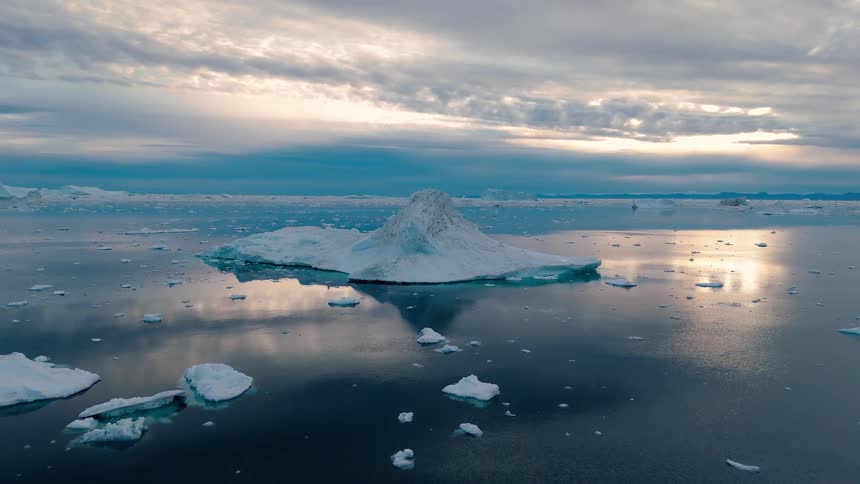 Melting iceberg and floating ice on arctic water
