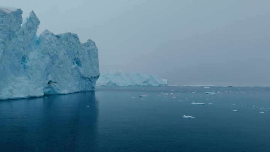 Melting iceberg and floating ice on arctic water